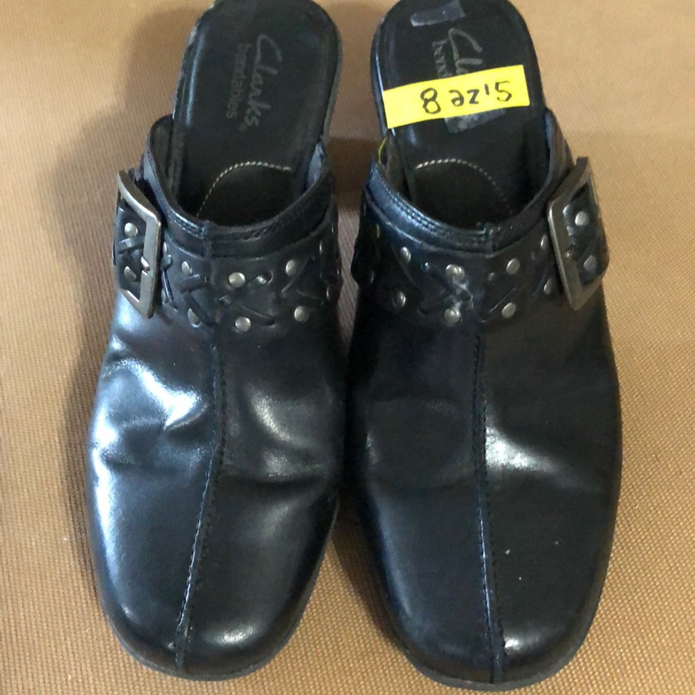 Clark’s black slide ons, open heel.